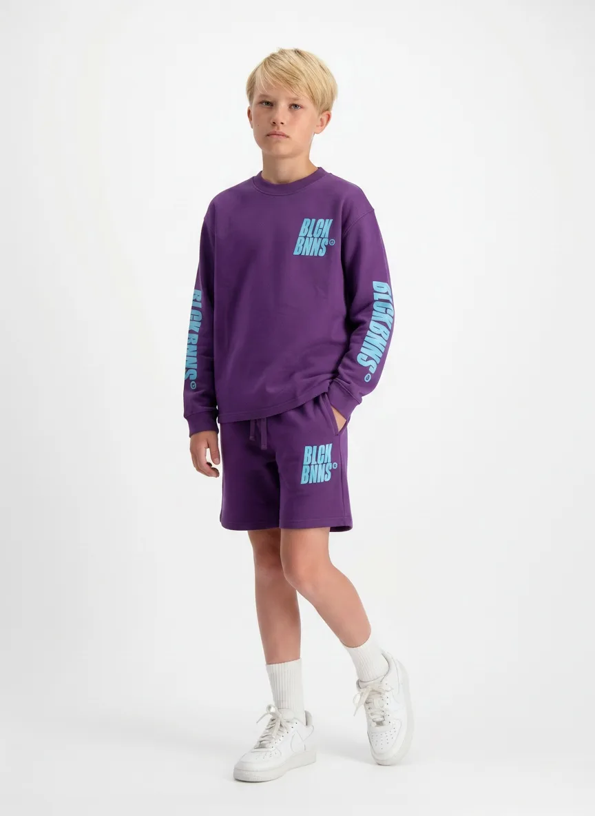 Black Bananas purple twinset chest crop on AI young model in clean white studio