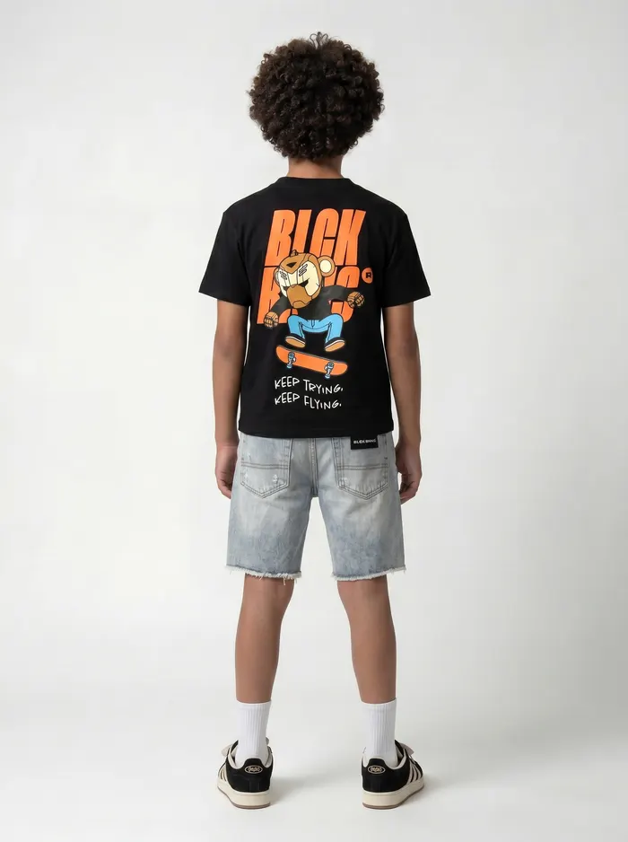 Black Bananas black orange-logo tee back view on AI young model in clean white studio