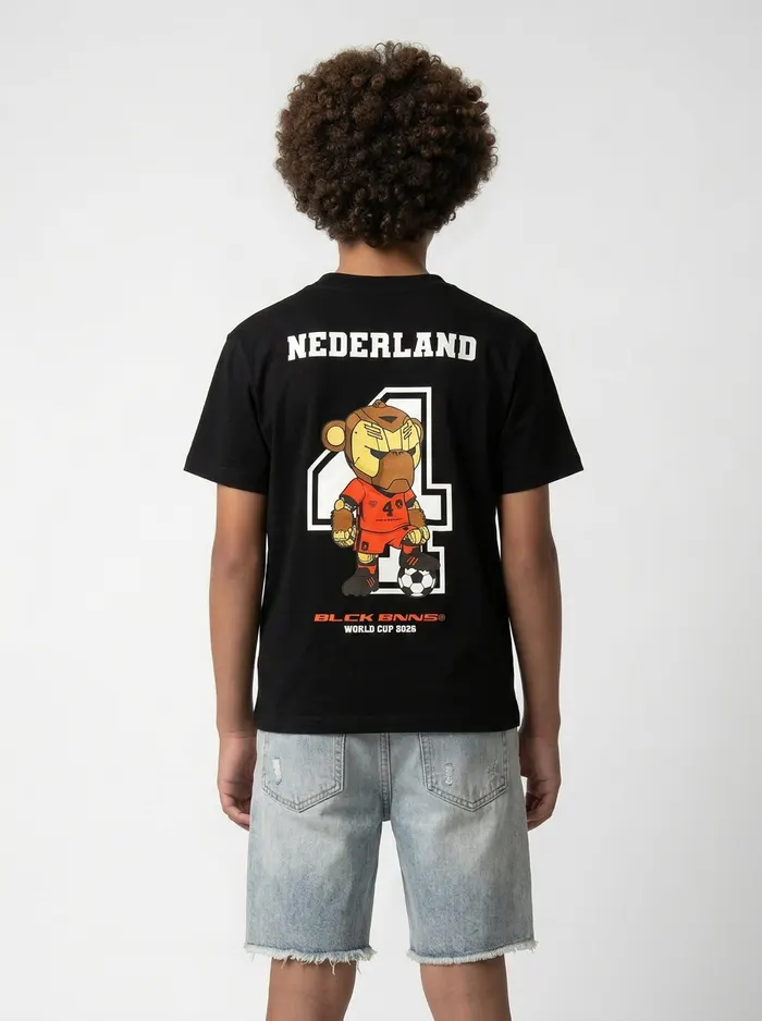 Black Bananas Nederland soccer chest-print tee alt pose on AI young model in clean white studio