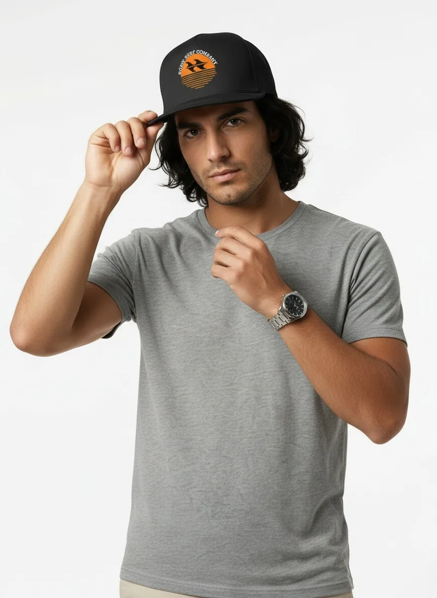 Bōdie Surf Co black trucker hat with orange sunset wave logo on AI male model in heather grey tee, clean white studio backdrop