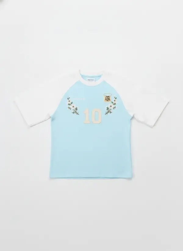 Bully Essence Club sky blue raglan tee shown as a product flat