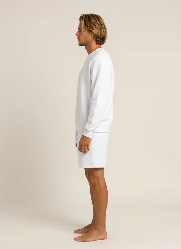 Future Homme white crew sweatshirt and matching short set, side profile, on an AI male model