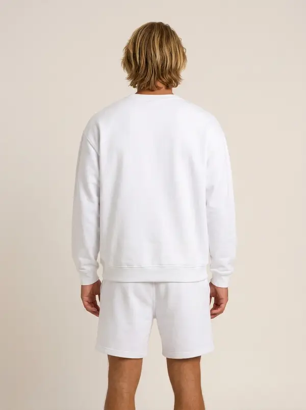 Future Homme white crew and short set, back view showing hem and cuff, on an AI male model
