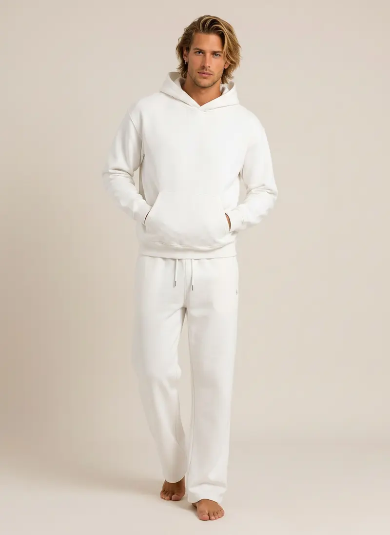 Future Homme white hooded sweatshirt and matching lounge pant on an AI male model, straight-on front