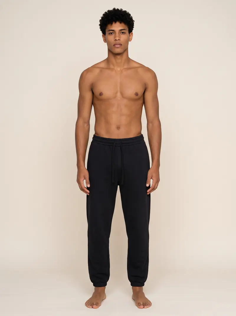 Future Homme navy jogger on the second AI male muse, straight-on front full length