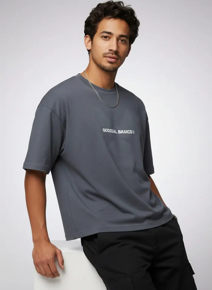 Godzeal Basics slate-blue dove-logo short-sleeve tee alt pose on AI male model in clean studio