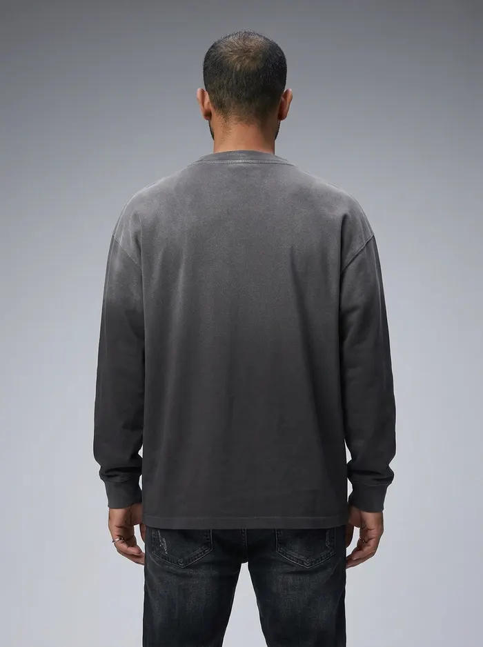 Godzeal LAMB OF GOD college-type long-sleeve side profile pose on AI male model with beard in clean studio