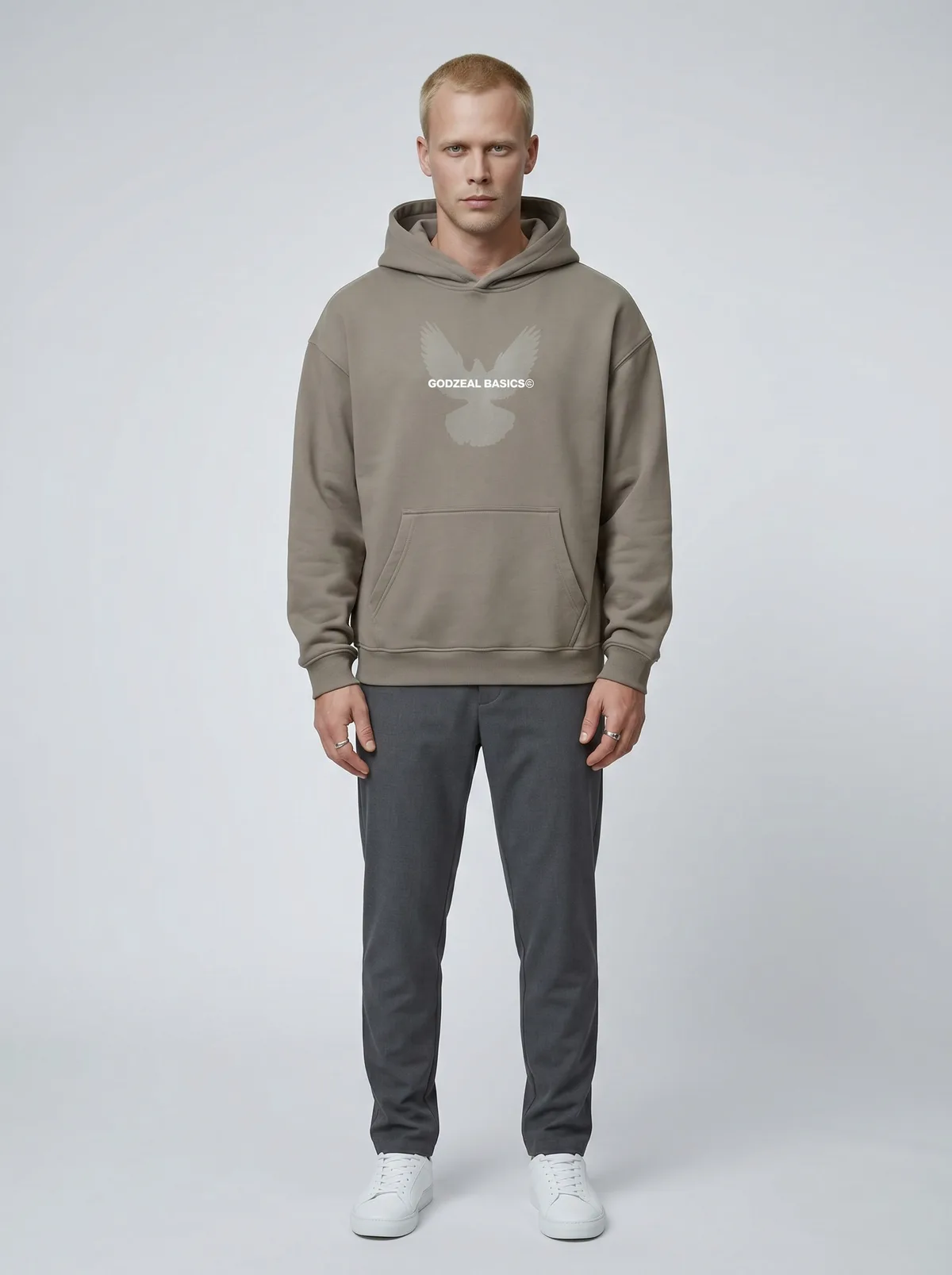 Godzeal Basics taupe dove-logo pullover hoodie on AI blonde male model in clean American studio