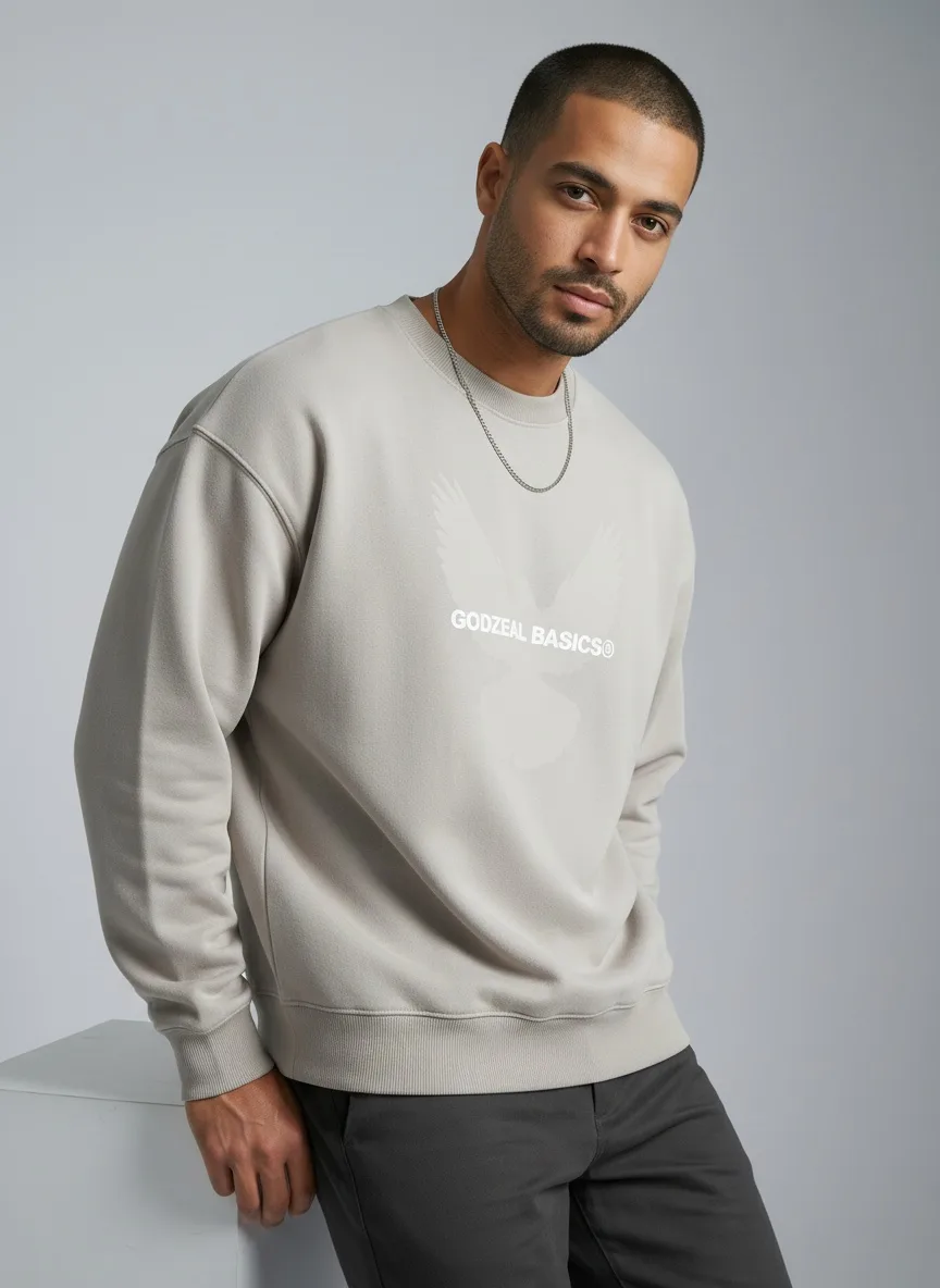 Godzeal Basics beige crewneck dove-logo sweater editorial portrait of AI male model in clean studio