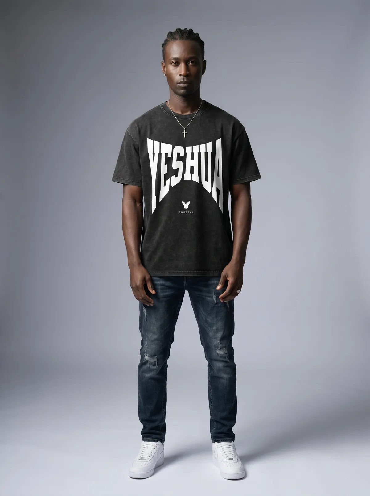 Godzeal YESHUA black acid wash arched-type tee on AI male model in clean American studio with full body framing