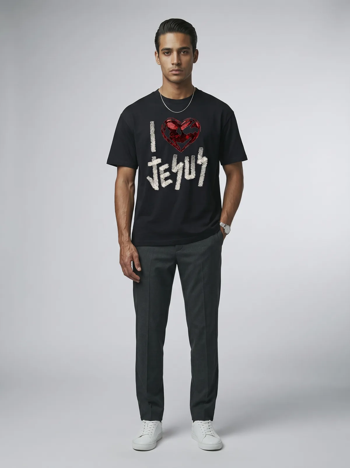 Godzeal black I LOVE JESUS heart-print tee on AI male model in dark slacks in clean American studio