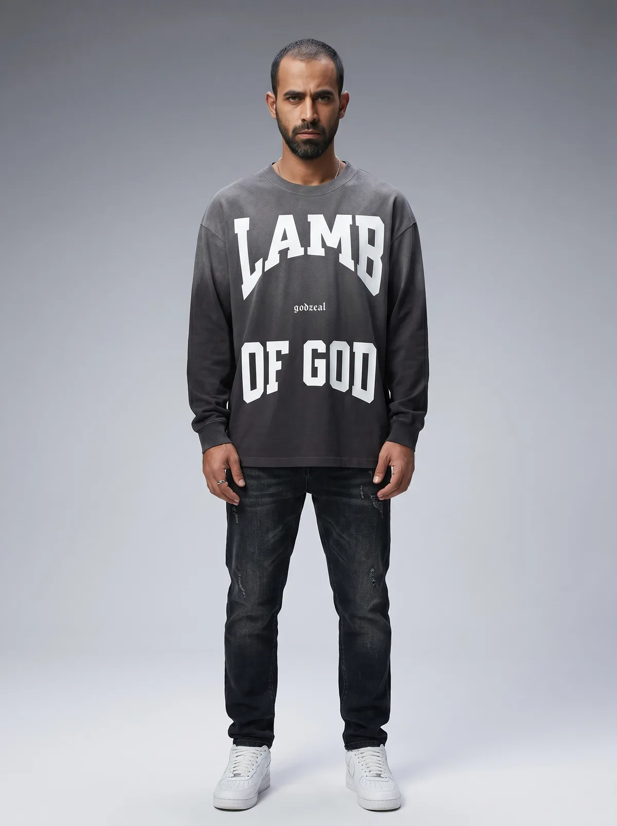 Godzeal LAMB OF GOD college-type print long-sleeve charcoal tee on AI male model with beard in clean American studio