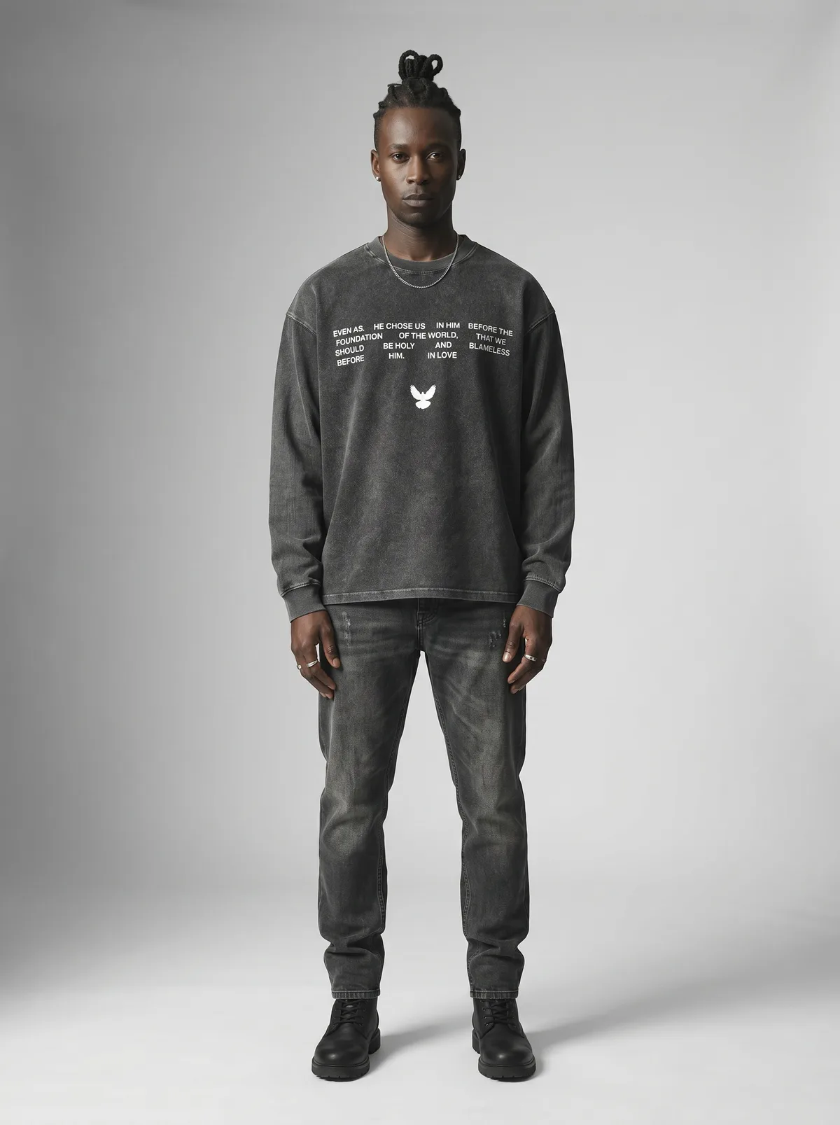 Godzeal acid wash scripture sweater Ephesians block-text print on AI male model with locs in clean American studio