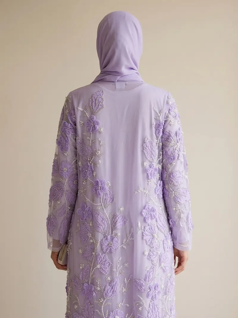 Modest Valoria lilac abaya back view with the hijab held and the hem falling to the floor