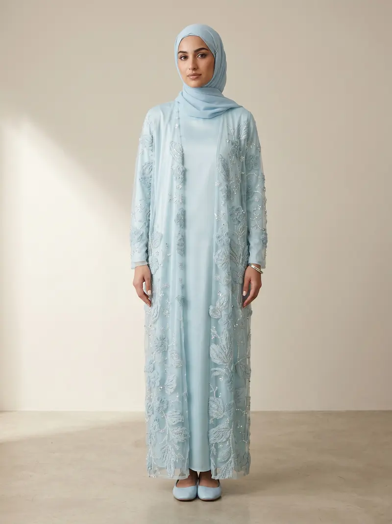 Modest Valoria powder blue embroidered open abaya over a satin under-dress with matching hijab, front full length