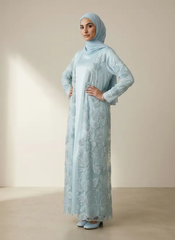 Modest Valoria powder blue abaya set, alternate three-quarter pose with hands at the waist
