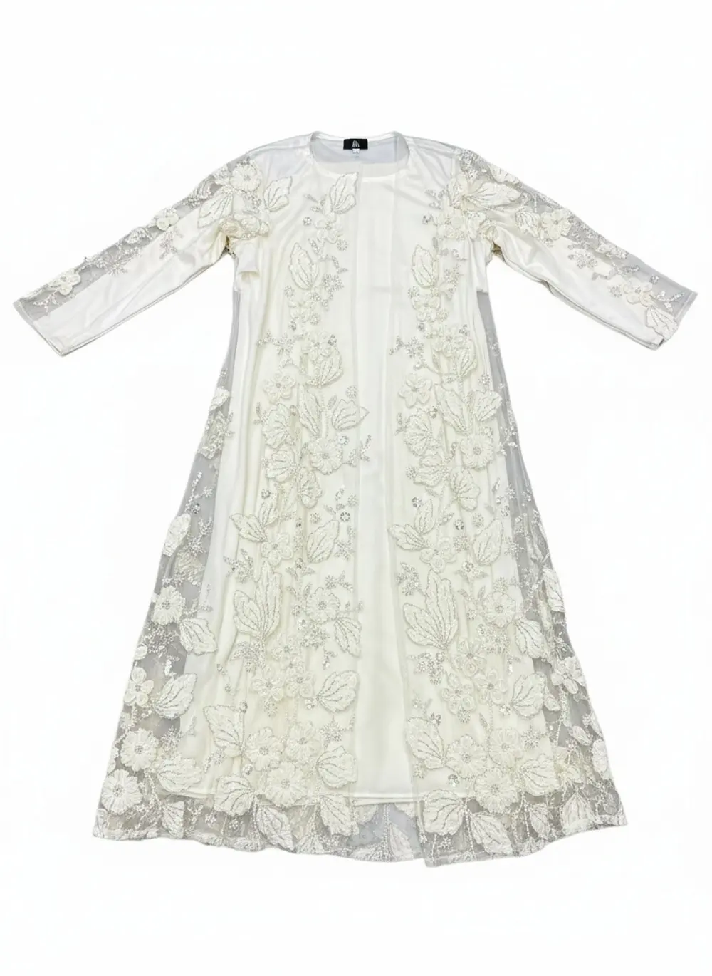 Modest Valoria ivory embroidered open abaya presented as a product flat on a clean background