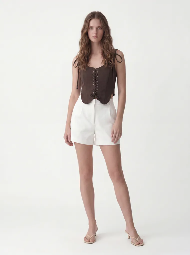 MODA AI output — the chocolate vest top on the same model and background, front