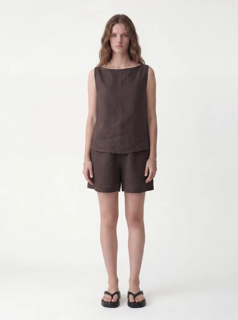 MODA AI catalog output — the linen tank-and-shorts set in chocolate brown on the same model and background
