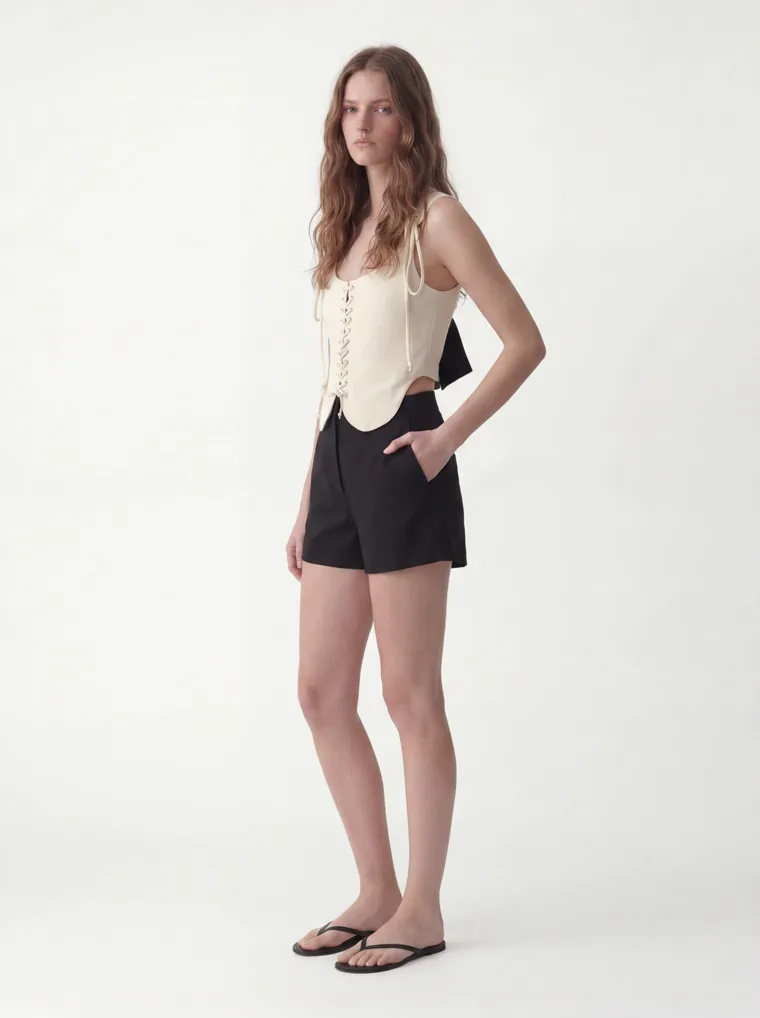 MODA AI catalog output — cream vest top, three-quarter front