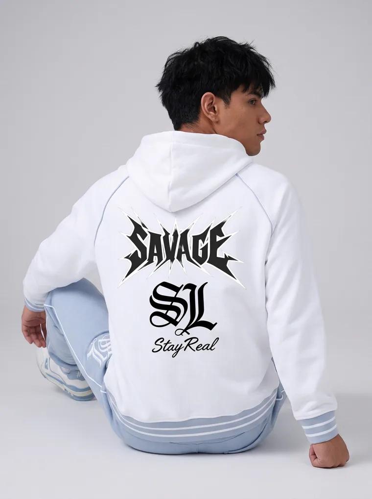 A model in a white zip through hoodie with gothic lettering and a large back print, worn with pale blue sweatpants, FW26 look 05