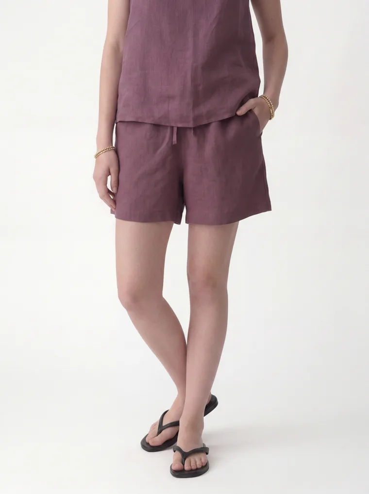 A mauve linen sleeveless top with matching drawstring shorts. FW26 look 11, Soft Utility in Mauve, frame 2 of 5