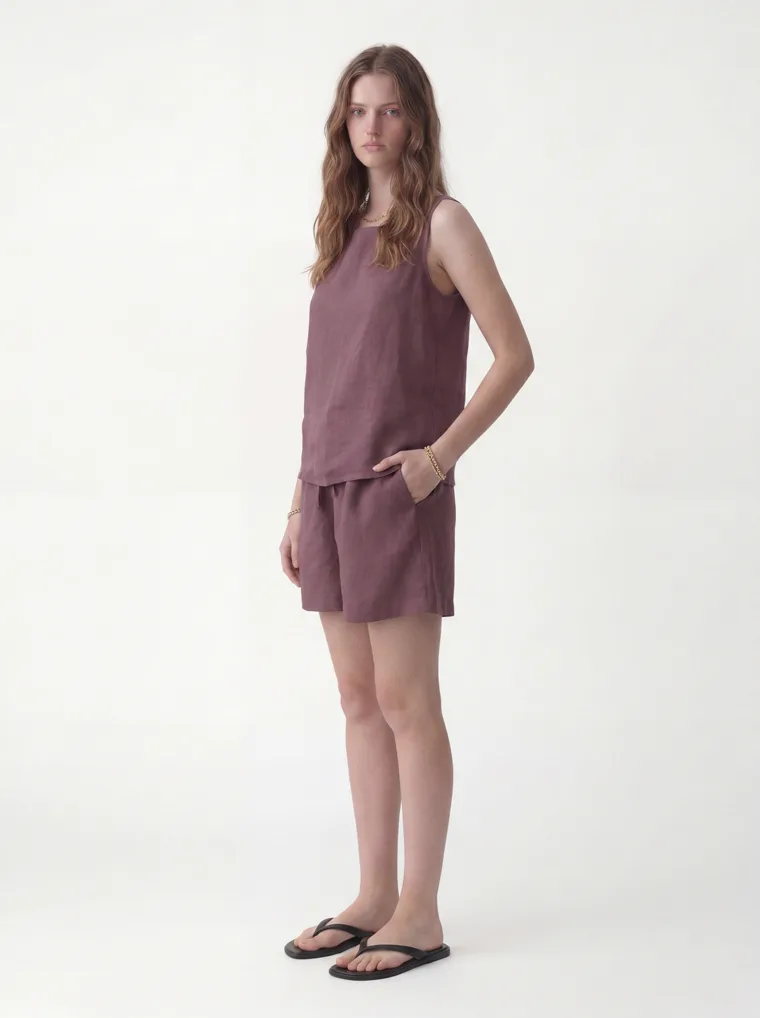A mauve linen sleeveless top with matching drawstring shorts. FW26 look 11, Soft Utility in Mauve, frame 3 of 5