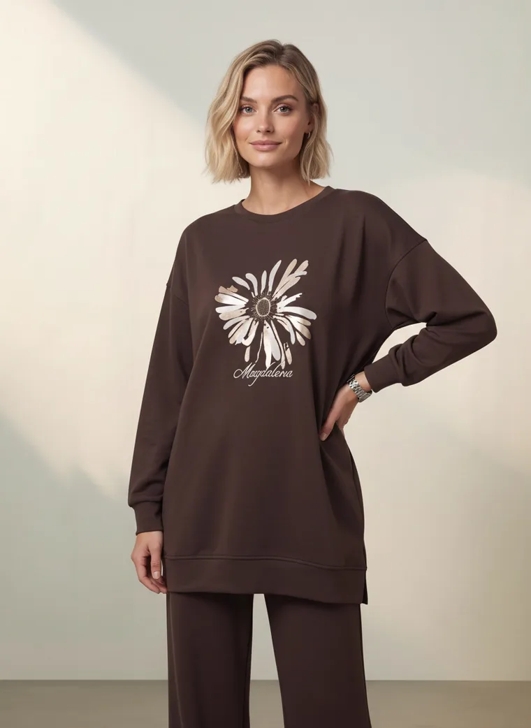 A chocolate brown sweatshirt with a cream daisy graphic and matching wide leg lounge trousers. FW26 look 12, Tonal Lounge in Chocolate, frame 3 of 5