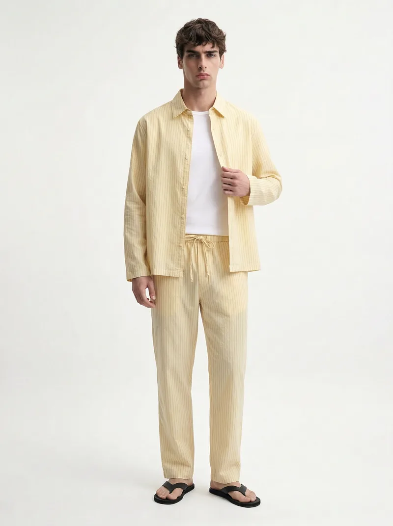 MODA AI output — model in the yellow set, back view