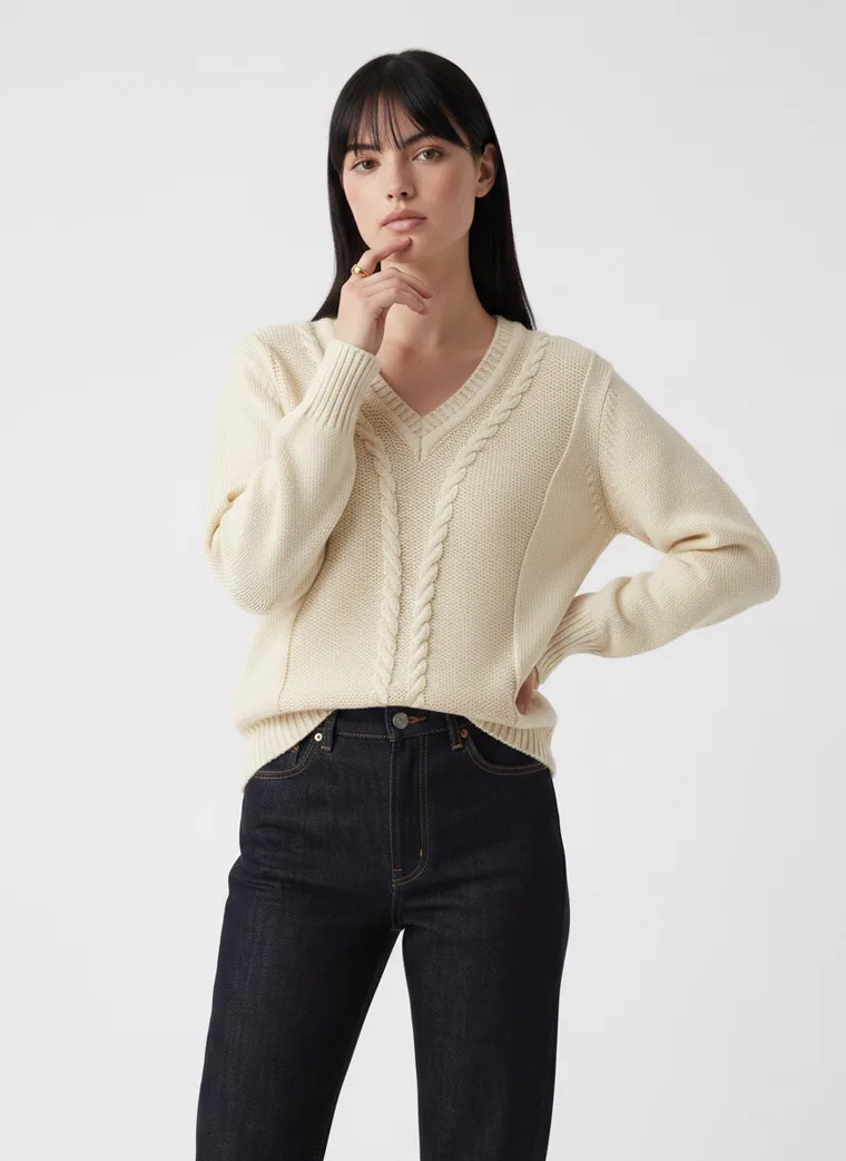 MODA AI output — the cable-knit jumper, waist-up pose showing the V-neck and cable panel
