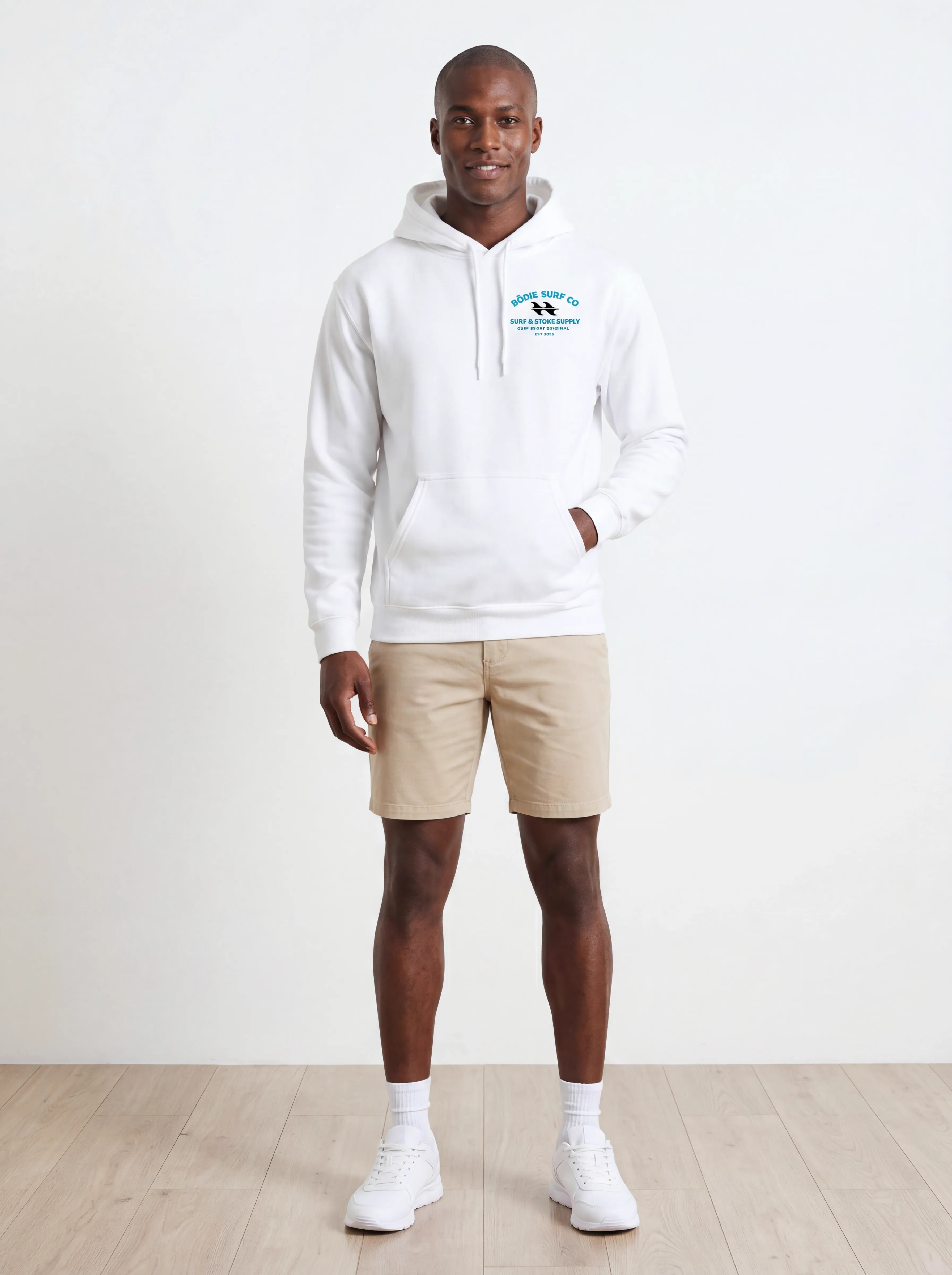 MODA AI output 1 — Black male model in white Bödie Surf Co hoodie, chest logo legible, demonstrating logo reproduction and skin tone realism