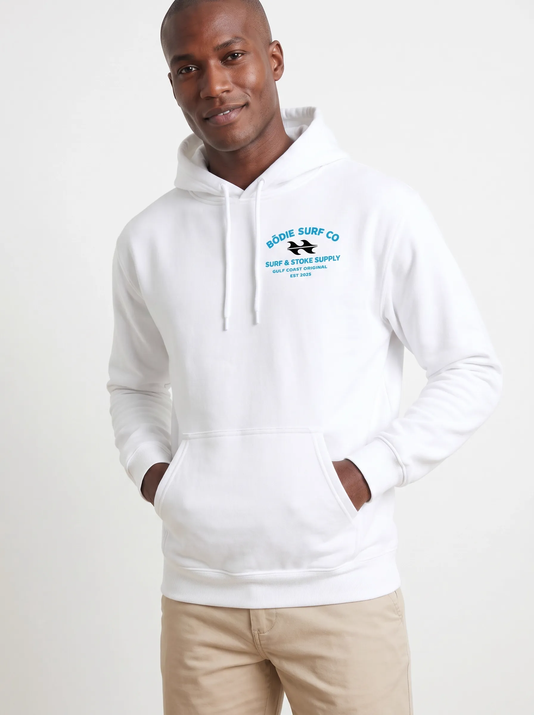 MODA AI output 2 — Black male model in white Bödie Surf Co hoodie, chest logo legible, demonstrating logo reproduction and skin tone realism