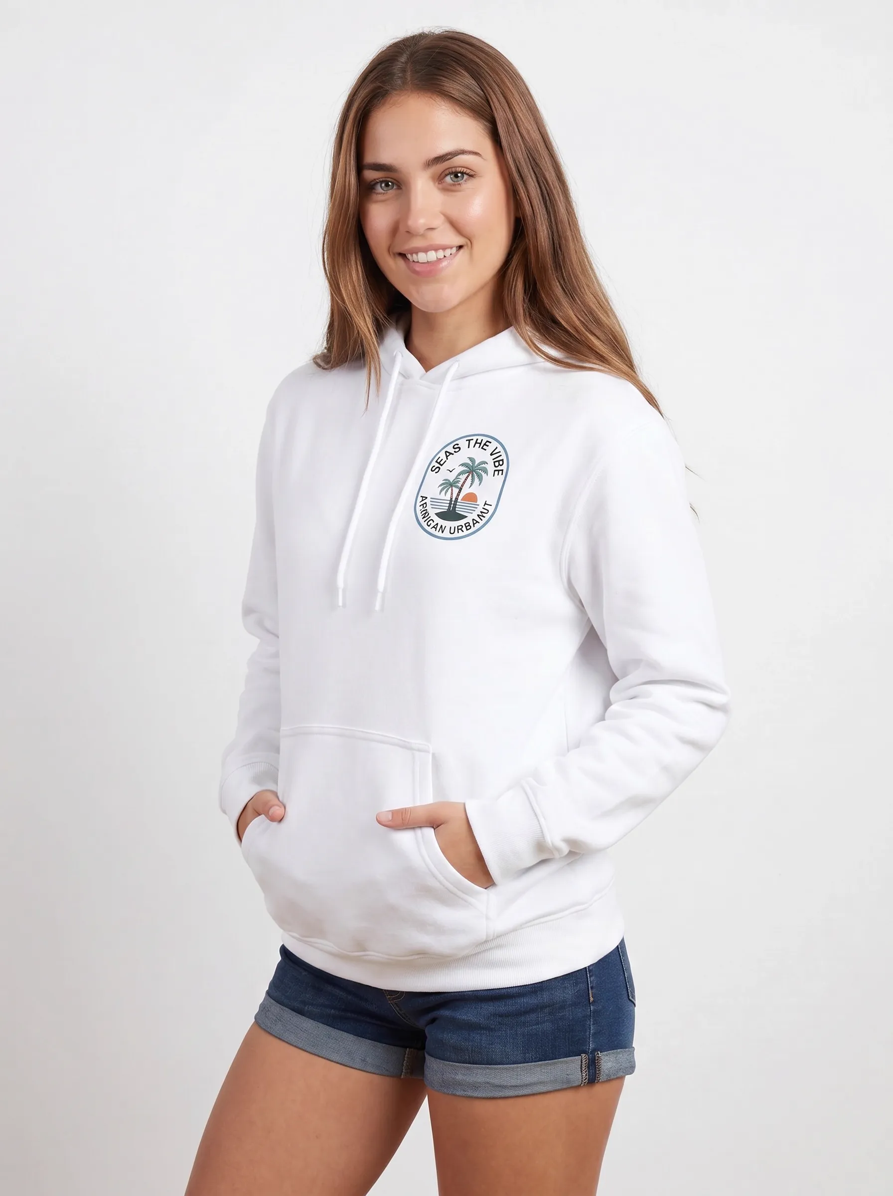 MODA AI back view — white hoodie with Seas the Vibe oval badge featuring palm tree and sunset illustration