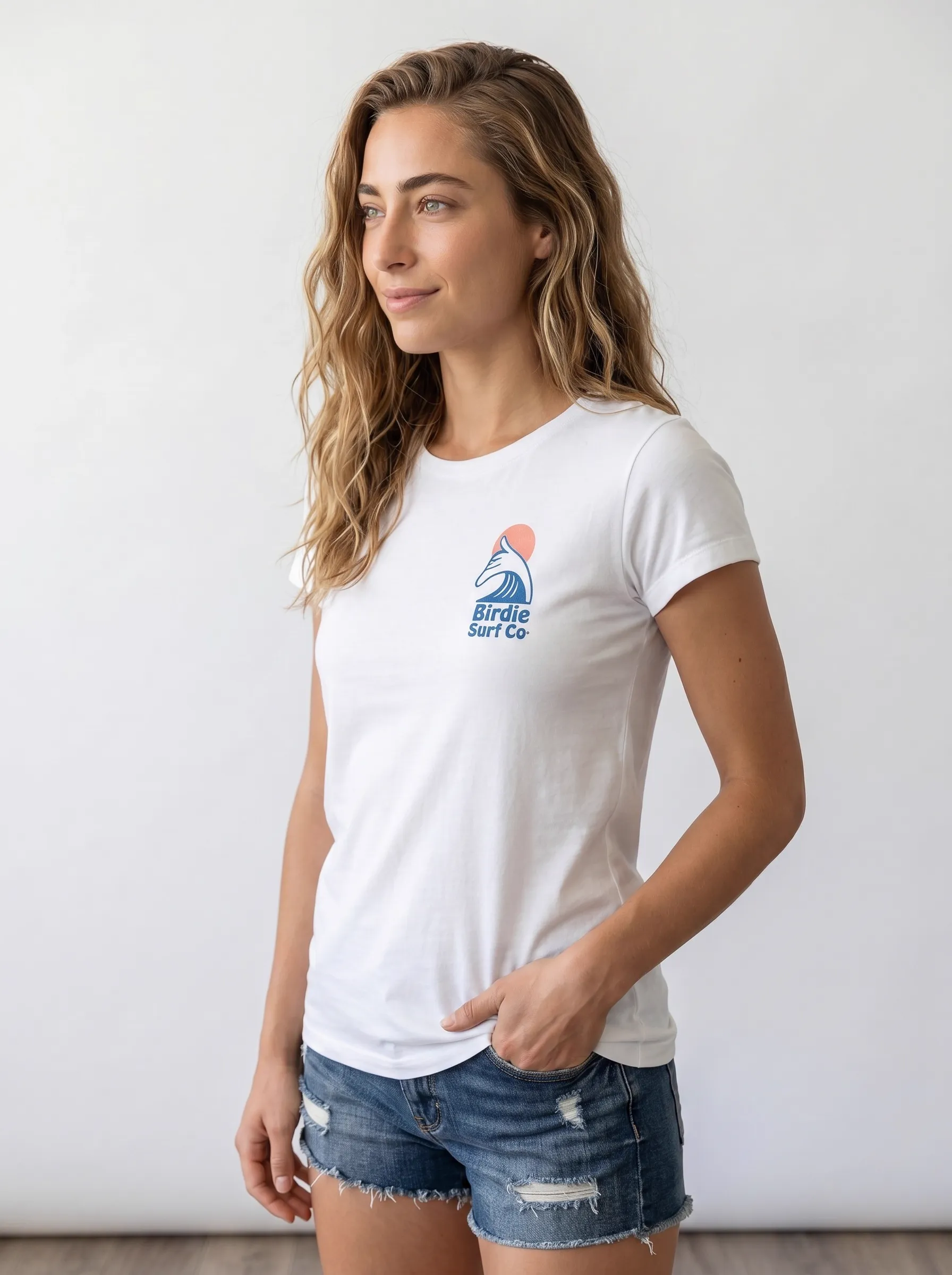 MODA AI output 3 — brunette female model in white Bödie Surf Co tee, locked by face reference, chest wave logo consistent across catalog angle