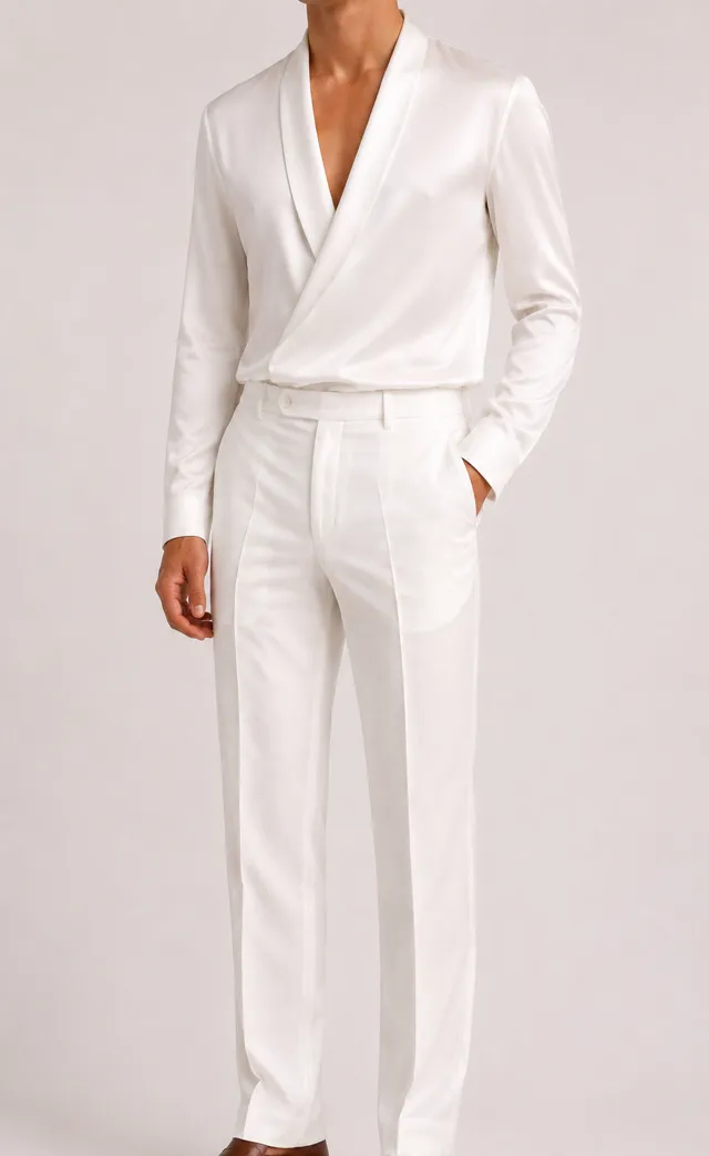 The seller’s own photo of the ivory shawl collar outfit against a white wall, the garment edges already going soft against the pale ground