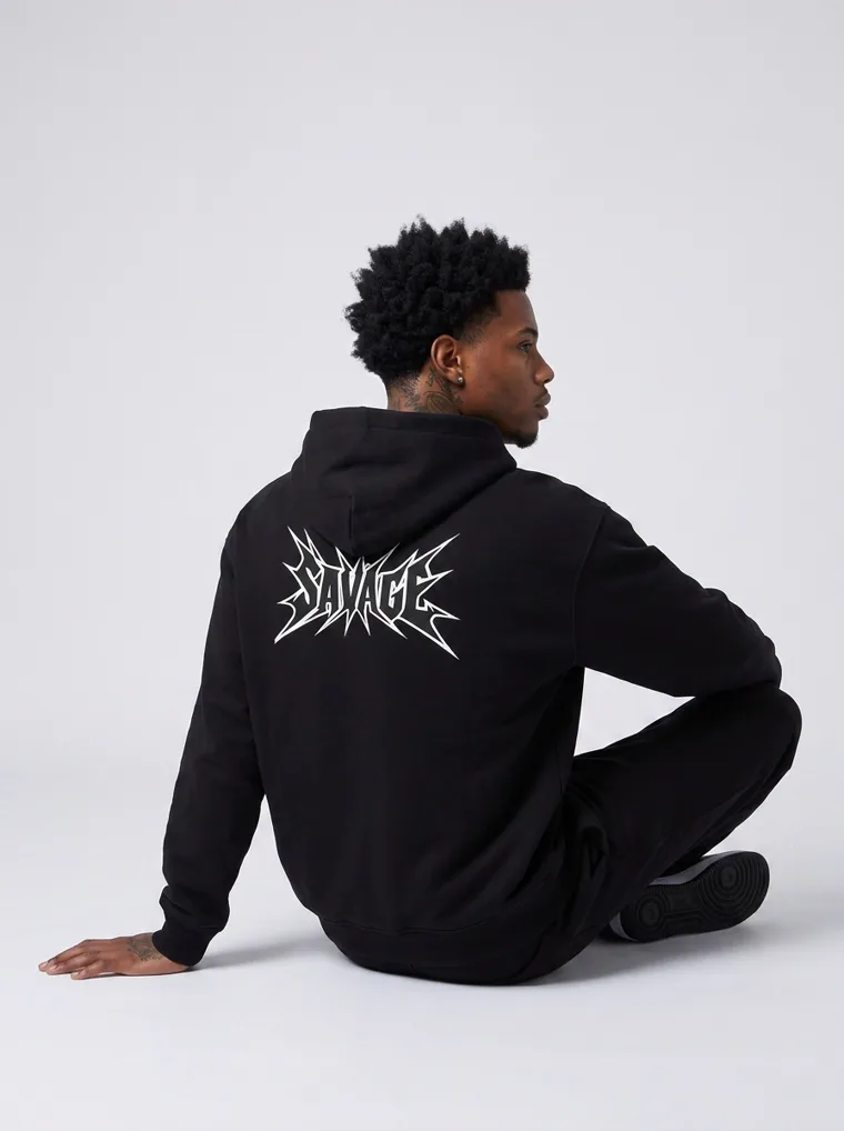 A black hoodie and sweatpants with a gothic chest print and a large matching back print. Graphic Hoodie Set in Black, frame 3 of 5