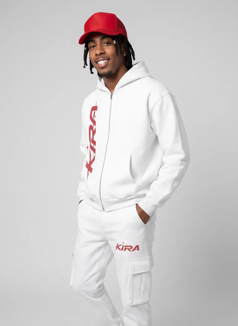 A white zip hoodie and cargo sweatpants with a red logo, red cap and red trimmed sneakers on light grey. Zip Hoodie Set in White, frame 3 of 5
