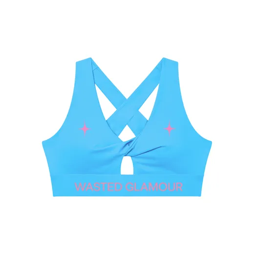 The starting photo for Keyhole Sports Bra in Sky Blue: the sports bra laid flat