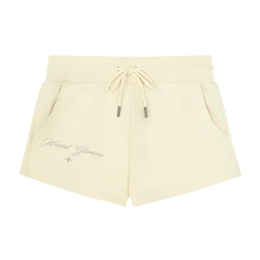 The starting photo for Drawstring Shorts in Cream: the cream shorts laid flat