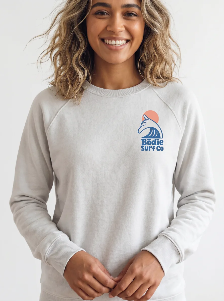 MODA AI output from the grey crewneck mockup — Back, full length, the Bodie Surf Co logo reproduced on the model