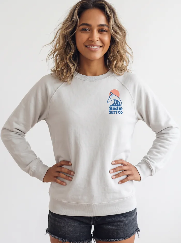 MODA AI output — Bodie Surf Co Crewneck sweatshirt on a model, part of one print collection generated from mockups