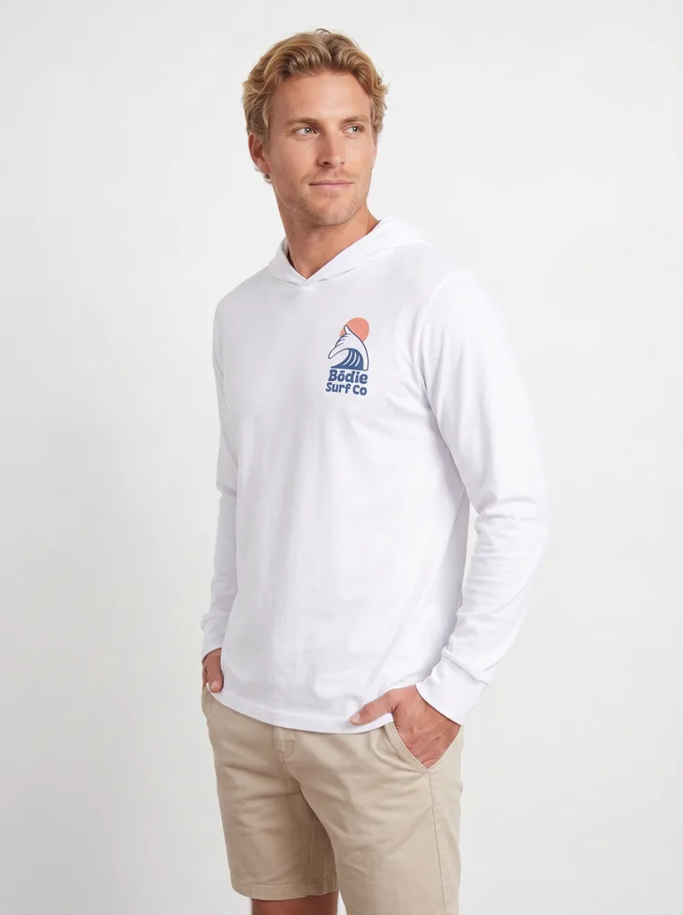 MODA AI output 2 of 10 from the white hooded long-sleeve mockup — one consistent male model, chest logo held across the catalog angle