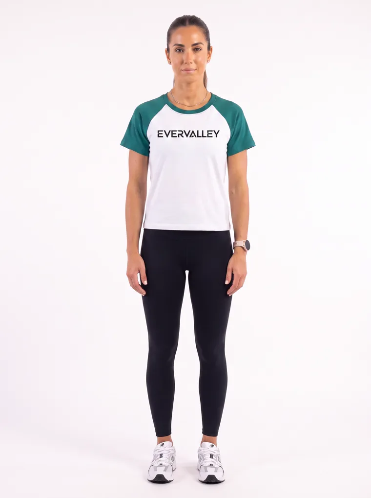 MODA AI output — raglan tee front view, chest wordmark straight-on at correct placement and scale