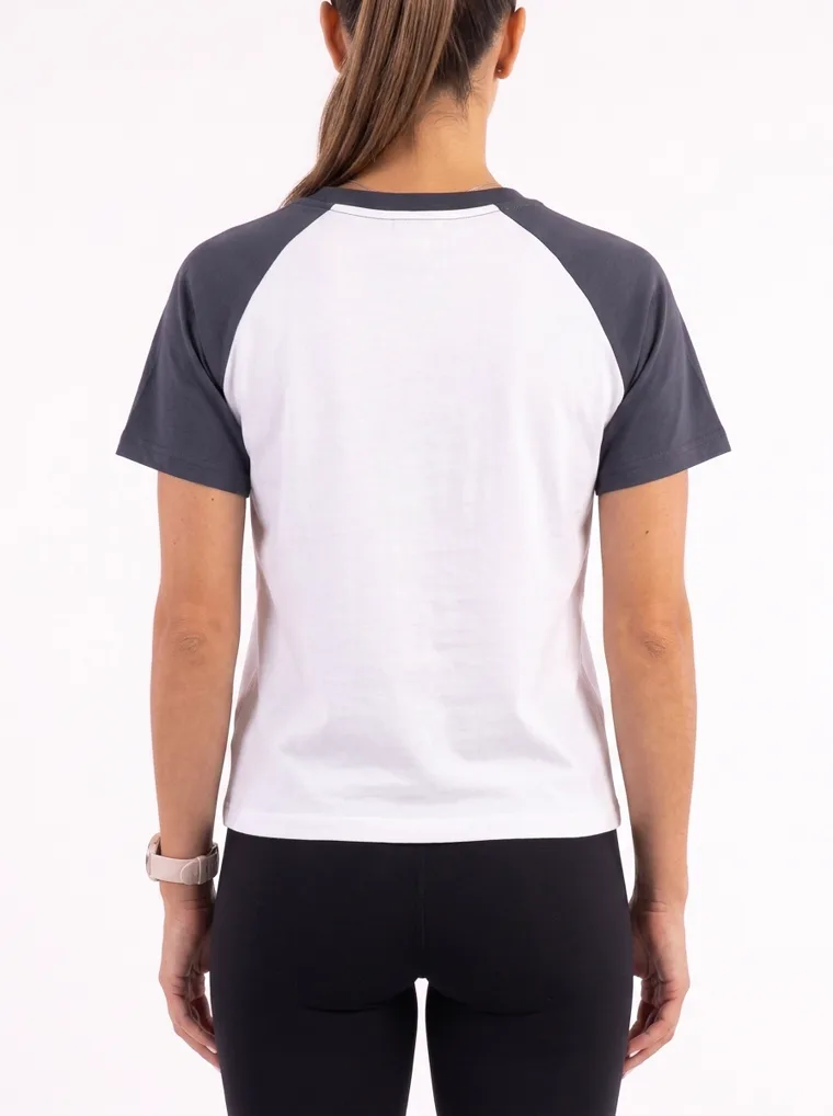 MODA AI output — the raglan tee in navy, back view, blank back with the raglan sleeve seams visible