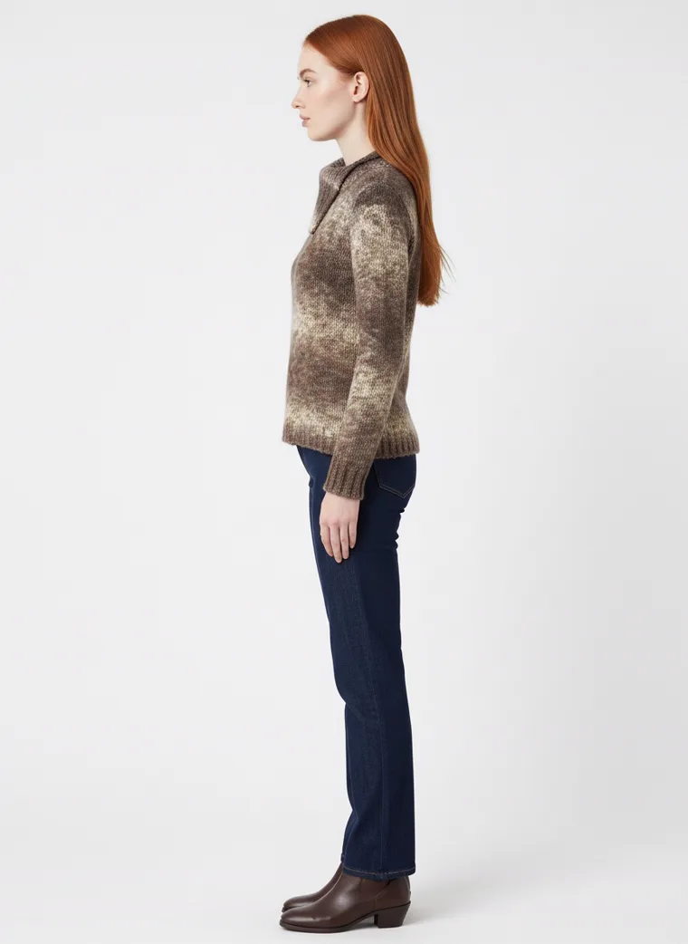 A space-dyed brown and cream marled knit sweater with a fold-over funnel neck, worn with dark straight jeans. Marled Funnel-Neck Knit in brown marl, side view