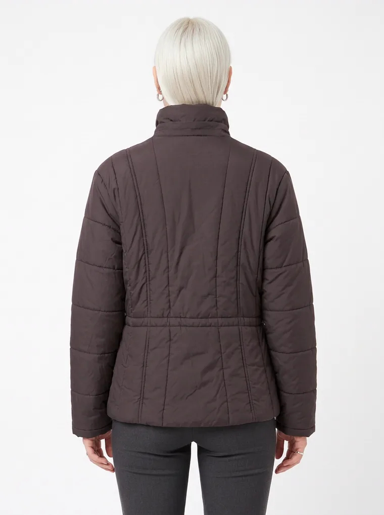 A dark brown channel-quilted puffer jacket with a stand collar and zip front, worn with grey trousers. Channel-Quilted Puffer in dark brown, back view