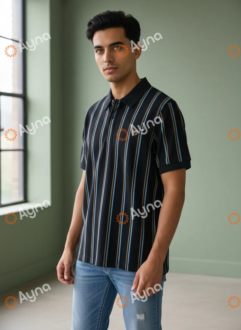 Ayna run two, the three quarter image, showing a different male model with no moustache and a narrower face wearing the same striped navy polo