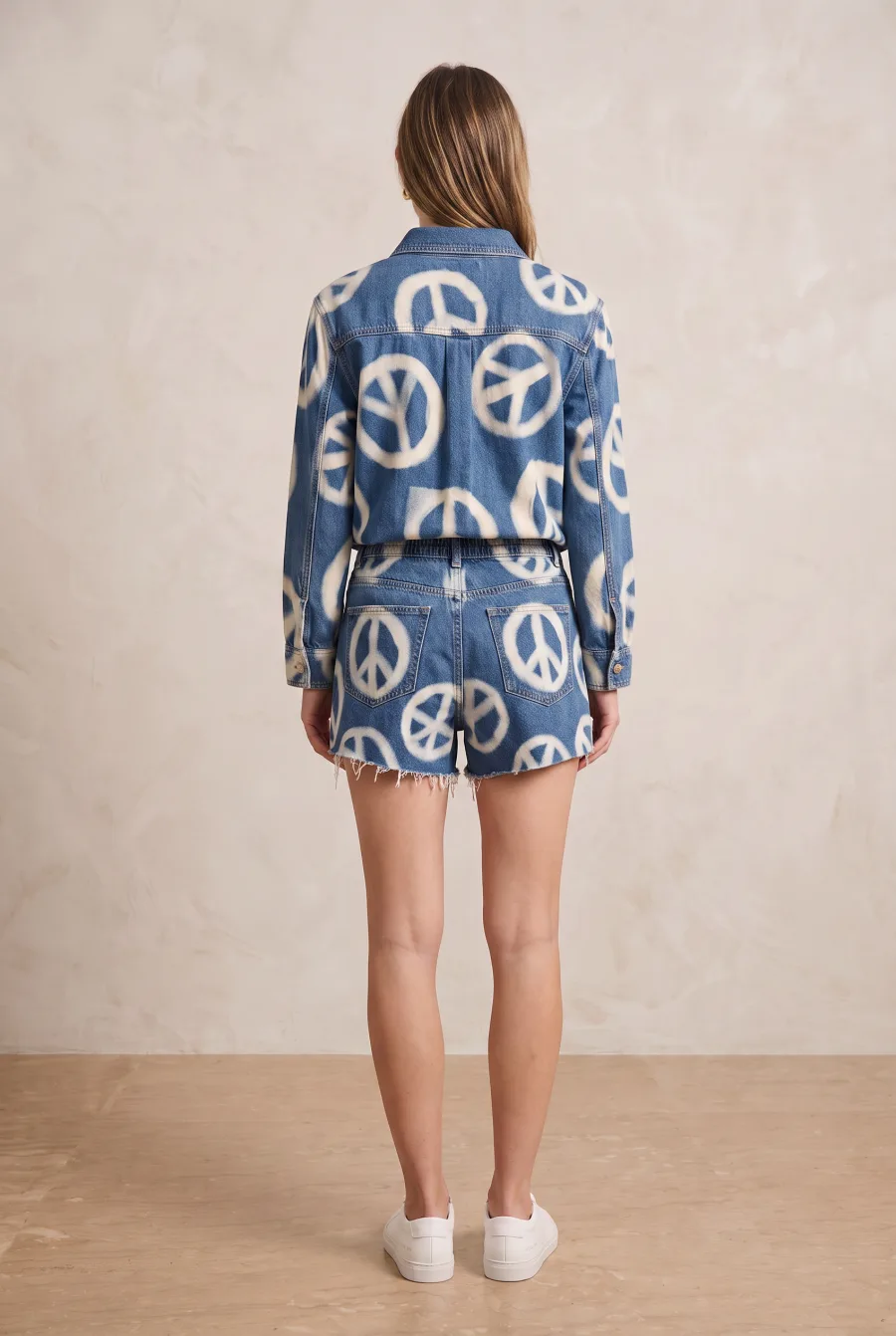 FASHN second output, the same denim shirt now cropped at the natural waist with the shorts waistband, belt loops and back pockets fully visible