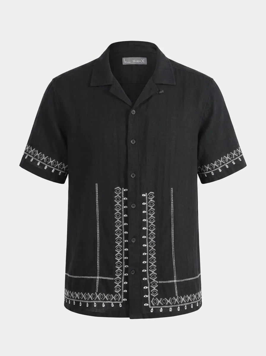 MODA AI output shot 10 of 10 from the same one-credit generation on the black embroidered shirt — brand model matching uploaded face reference, Amsterdam canal scene matching uploaded background reference